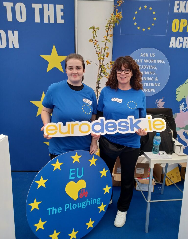 Eurodesk staff holding Eurodesk sign